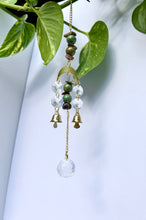 Load image into Gallery viewer, Mini Gold Moon Suncatcher with Turquoise Clay & Tiger’s Eye Beads, Gold Chain, and Bells – Witchy Boho Rainbow Light Decor