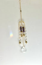 Load image into Gallery viewer, Gold Moon Phase Suncatcher with Amethyst & Tiger’s Eye Beads, Gold Starburst Charm, Bells, and Sun Prism Beads – Witchy Boho Decor