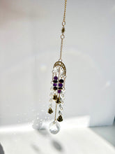 Load image into Gallery viewer, Gold Moon Phase Suncatcher with Amethyst & Tiger’s Eye Beads, Gold Starburst Charm, Bells, and Sun Prism Beads – Witchy Boho Decor