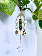 Load image into Gallery viewer, Mini Gold Moon Suncatcher with Turquoise Clay & Tiger’s Eye Beads, Gold Chain, and Bells – Witchy Boho Rainbow Light Decor