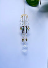 Load image into Gallery viewer, Gold Moon Phases Suncatcher with Turquoise & Tiger’s Eye Beads, Bells, and Crystal Accents – Witchy Boho Decor