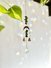 Load image into Gallery viewer, Mini Gold Moon Suncatcher with Turquoise Clay & Tiger’s Eye Beads, Gold Chain, and Bells – Witchy Boho Rainbow Light Decor