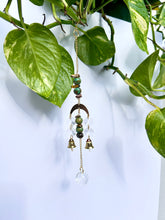 Load image into Gallery viewer, Mini Gold Moon Suncatcher with Turquoise Clay & Tiger’s Eye Beads, Gold Chain, and Bells – Witchy Boho Rainbow Light Decor