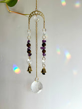 Load image into Gallery viewer, Gold Moon Phases Suncatcher with Amethyst & Tiger’s Eye Beads and Gold Bells – Celestial Window Decor