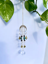 Load image into Gallery viewer, Gold Moon Phases Suncatcher with Turquoise & Tiger’s Eye Beads, Bells, and Crystal Accents – Witchy Boho Decor