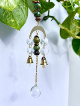 Load image into Gallery viewer, Mini Gold Moon Suncatcher with Turquoise Clay & Tiger’s Eye Beads, Gold Chain, and Bells – Witchy Boho Rainbow Light Decor