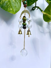 Load image into Gallery viewer, Mini Gold Moon Suncatcher with Turquoise Clay & Tiger’s Eye Beads, Gold Chain, and Bells – Witchy Boho Rainbow Light Decor