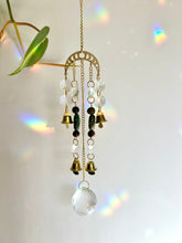 Load image into Gallery viewer, Gold Moon Phases Suncatcher with Turquoise & Tiger’s Eye Beads, Bells, and Crystal Accents – Witchy Boho Decor