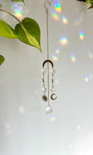 Load image into Gallery viewer, Mini Gold Charm Suncatcher with Opalite, Green & Blue Glass Beads, Sun & Moon Charms – Rainbow Prism Window Decor