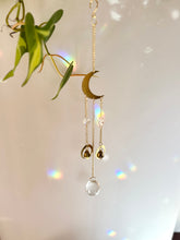 Load image into Gallery viewer, Gold Half Moon Suncatcher with Prism Beads and Bells – Rainbow Light Window Decor