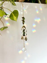 Load image into Gallery viewer, Mini Gold Moon Suncatcher with Turquoise Clay & Tiger’s Eye Beads, Gold Chain, and Bells – Witchy Boho Rainbow Light Decor