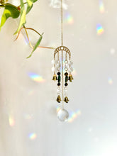 Load image into Gallery viewer, Gold Moon Phases Suncatcher with Turquoise & Tiger’s Eye Beads, Bells, and Crystal Accents – Witchy Boho Decor