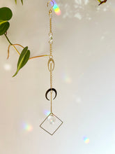 Load image into Gallery viewer, Double Gold Half Moon Suncatcher with Prism in Diamond Frame – Mystical Rainbow Window Decor