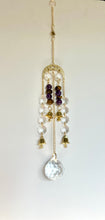 Load image into Gallery viewer, Gold Moon Phase Suncatcher with Amethyst & Tiger’s Eye Beads, Gold Starburst Charm, Bells, and Sun Prism Beads – Witchy Boho Decor