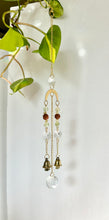 Load image into Gallery viewer, Mini Gold Charm Suncatcher with Rudraksha & Aventurine Beads, Prism Accents, and Bells – Spiritual Rainbow Decor