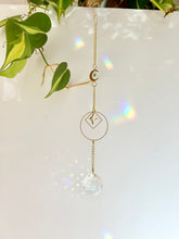 Load image into Gallery viewer, Gold Charm Suncatcher with Moon, Starburst, Round & Diamond Shapes, Green & Blue Glass Beads – Rainbow Prism Window Decor