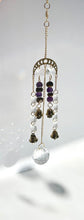 Load image into Gallery viewer, Gold Moon Phase Suncatcher with Amethyst & Tiger’s Eye Beads, Gold Starburst Charm, Bells, and Sun Prism Beads – Witchy Boho Decor