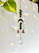 Load image into Gallery viewer, Mini Gold Moon Suncatcher with Turquoise Clay & Tiger’s Eye Beads, Gold Chain, and Bells – Witchy Boho Rainbow Light Decor