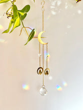 Load image into Gallery viewer, Gold Half Moon Suncatcher with Prism Beads and Bells – Rainbow Light Window Decor