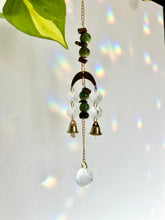 Load image into Gallery viewer, Mini Gold Moon Suncatcher with Turquoise Clay & Tiger’s Eye Beads, Gold Chain, and Bells – Witchy Boho Rainbow Light Decor