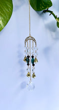 Load image into Gallery viewer, Gold Moon Phases Suncatcher with Turquoise & Tiger’s Eye Beads, Bells, and Crystal Accents – Witchy Boho Decor