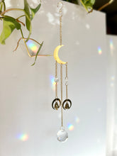 Load image into Gallery viewer, Gold Half Moon Suncatcher with Prism Beads and Bells – Rainbow Light Window Decor