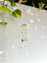 Load image into Gallery viewer, Mini Gold Charm Suncatcher with Opalite, Green & Blue Glass Beads, Sun & Moon Charms – Rainbow Prism Window Decor