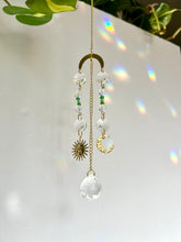 Load image into Gallery viewer, Mini Gold Charm Suncatcher with Opalite, Green & Blue Glass Beads, Sun & Moon Charms – Rainbow Prism Window Decor