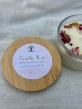 Load image into Gallery viewer, Vanilla Rose Soy Wax Candle – Handcrafted with a Floral Vanilla Scent, Made from Natural Soy Wax for a Clean, Long-Lasting Burn. Enhanced with Rose Petals and Clear Quartz Crystal with a Glass Jar with a Sustainable Bamboo Lid. Perfect for Relaxation, Home Decor, and Thoughtful Gifts – Eco-Friendly, Ideal for Aromatherapy and Self-Care.