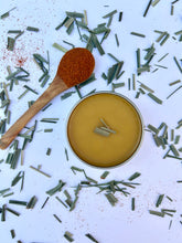 Load image into Gallery viewer, Portable herbal muscle rub in a 2 oz tin, perfect for gym, hiking, or on-the-go use.