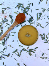 Load image into Gallery viewer, Portable herbal muscle rub in a 2 oz tin, perfect for gym, hiking, or on-the-go use.