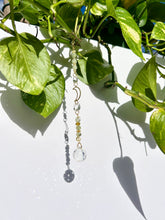 Load image into Gallery viewer, Car or small window mini suncatcher with gold moon charm and gemstone beads casting rainbow reflections