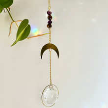 Load image into Gallery viewer, Gold moon suncatcher with Amethyst and Tiger’s Eye beads and round gold prism for rainbow window decor