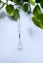Load image into Gallery viewer, Handmade Amethyst and Citrine dual prism suncatcher with gold circle frames for rainbow window light