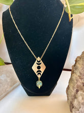 Load image into Gallery viewer, Moon phases gold necklace featuring a natural labradorite gemstone on an adjustable gold chain