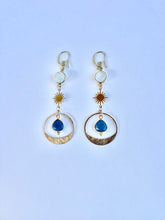 Load image into Gallery viewer, handcrafted moonstone and denim opal boho dangle earrings with brass sunburst details.