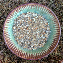 Load image into Gallery viewer, Loose Singer’s Zinger Throat and Digestion Herbal Tea in bowl | Ginger, mullein, marshmallow root and lemon peel loose leaf blend