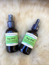 Load image into Gallery viewer, Natural bug repellent spray with witch hazel, apple cider vinegar, and essential oils like citronella and geranium, providing chemical-free protection against mosquitoes and ticks.