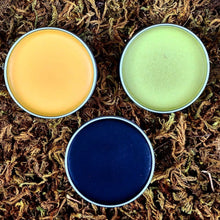 Load image into Gallery viewer, Natural first aid kit with herbal salves for soothing skin and muscle discomfort, made with a blend of organic and wildcrafted botanicals like calendula, comfrey, and lavender.