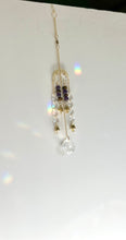 Load image into Gallery viewer, Gold Moon Phase Suncatcher with Amethyst &amp; Tiger’s Eye Beads, Gold Starburst Charm, Bells, and Sun Prism Beads – Witchy Boho Decor
