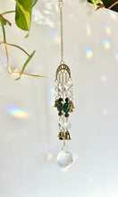 Load image into Gallery viewer, Gold Moon Phases Suncatcher with Turquoise &amp; Tiger’s Eye Beads, Bells, and Crystal Accents – Witchy Boho Decor
