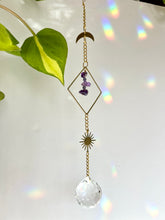 Load image into Gallery viewer, Rainbow Maker Suncatcher with Gold Half Moon &amp; Sun Charms, Amethyst Beads in Gold Diamond Frame – Prism Window Decor
