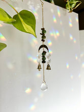 Load image into Gallery viewer, Mini Gold Moon Suncatcher with Turquoise Clay &amp; Tiger’s Eye Beads, Gold Chain, and Bells – Witchy Boho Rainbow Light Decor
