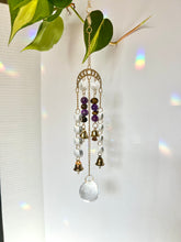 Load image into Gallery viewer, Gold Moon Phase Suncatcher with Amethyst &amp; Tiger’s Eye Beads, Gold Starburst Charm, Bells, and Sun Prism Beads – Witchy Boho Decor
