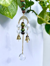Load image into Gallery viewer, Mini Gold Moon Suncatcher with Turquoise Clay &amp; Tiger’s Eye Beads, Gold Chain, and Bells – Witchy Boho Rainbow Light Decor
