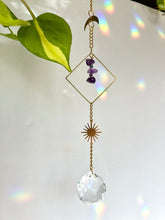 Load image into Gallery viewer, Rainbow Maker Suncatcher with Gold Half Moon &amp; Sun Charms, Amethyst Beads in Gold Diamond Frame – Prism Window Decor
