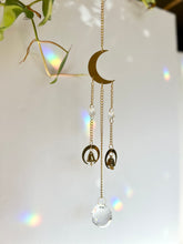 Load image into Gallery viewer, Gold Half Moon Suncatcher with Prism Beads and Bells – Rainbow Light Window Decor
