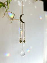 Load image into Gallery viewer, Gold Half Moon Suncatcher with Prism Beads and Bells – Rainbow Light Window Decor
