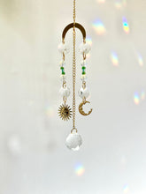 Load image into Gallery viewer, Mini Gold Charm Suncatcher with Opalite, Green &amp; Blue Glass Beads, Sun &amp; Moon Charms – Rainbow Prism Window Decor
