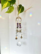 Load image into Gallery viewer, Gold Moon Phase Suncatcher with Amethyst &amp; Tiger’s Eye Beads, Gold Starburst Charm, Bells, and Sun Prism Beads – Witchy Boho Decor
